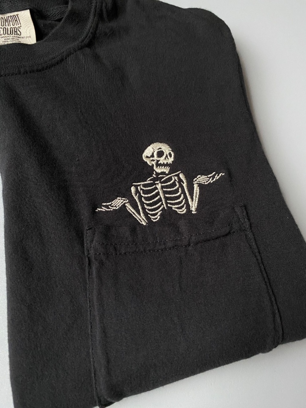 Embroidered skeleton pocket tshirt